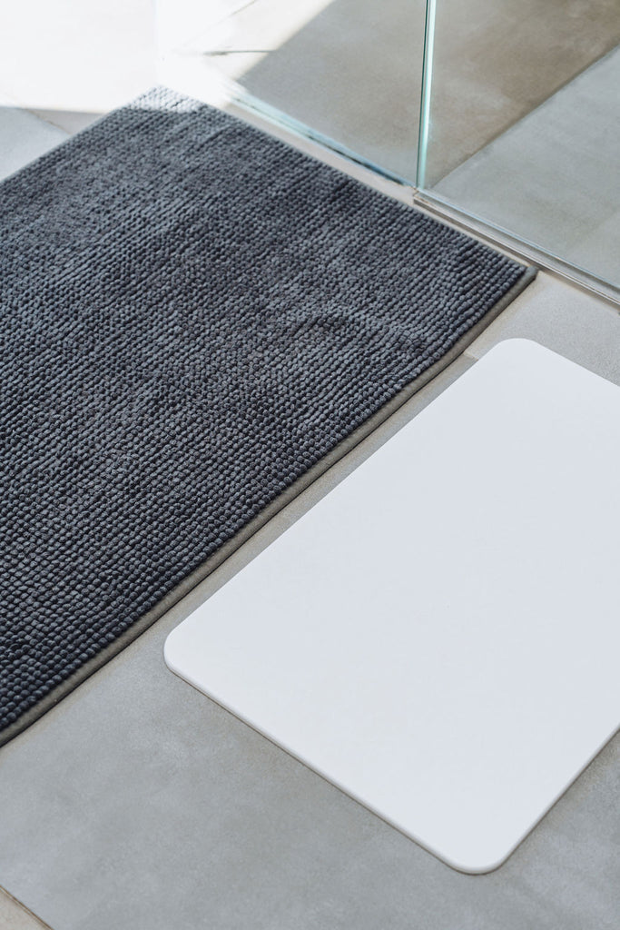 Traditionele badmatten vs Pure Absorb badmatten